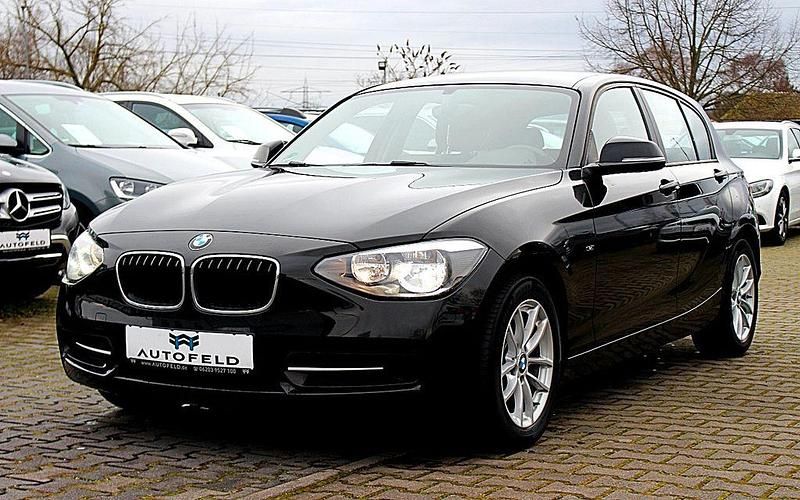 Schwarz Gebraucht 2013 BMW 116 Sport Line Kleinwagen | 8.900 € (Fairer Preis) - Bild 1/4