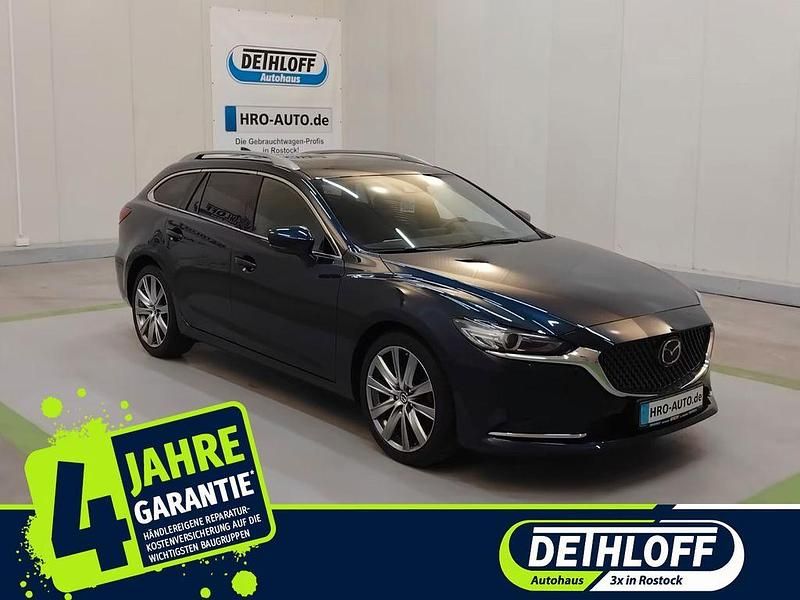 Deep crystal blue Gebraucht 2024 Mazda 6 Takumi-Line Kombi | 29.500 € (Fairer Preis) - Bild 1/4