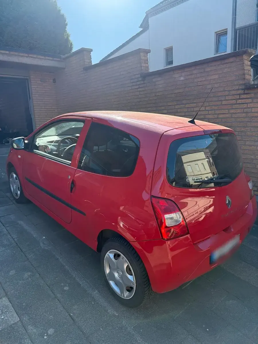 Second-hand Renault Twingo 60 CP (44 kW) 2011 Roșu Hatchback