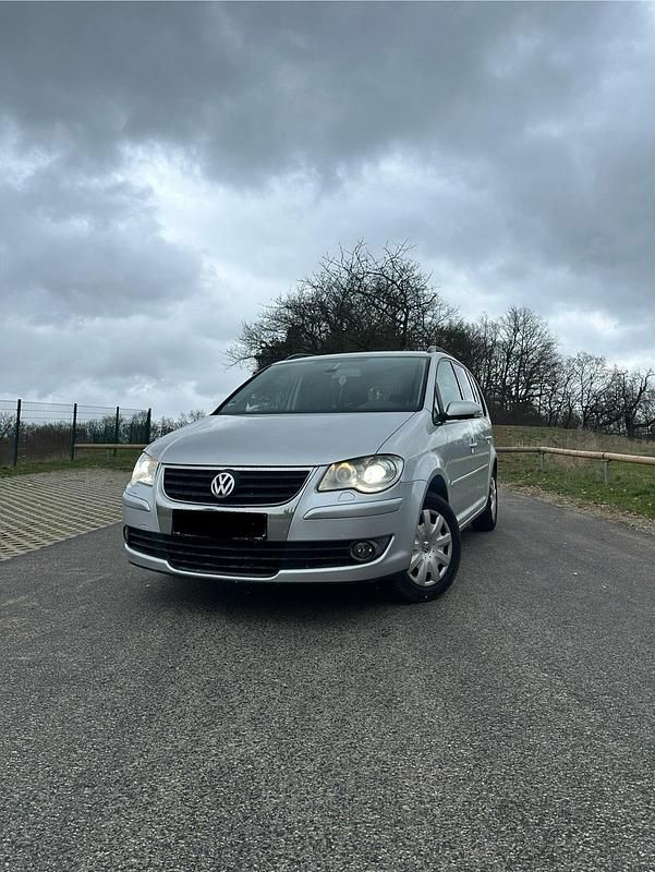Gebraucht VW Touran 105 PS (77 kW) 2007 Silber Van / Kleinbus
