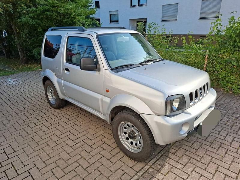 Grau Gebraucht 2001 Suzuki Jimny SUV | 5.500 € (Fairer Preis) - Bild 1/4