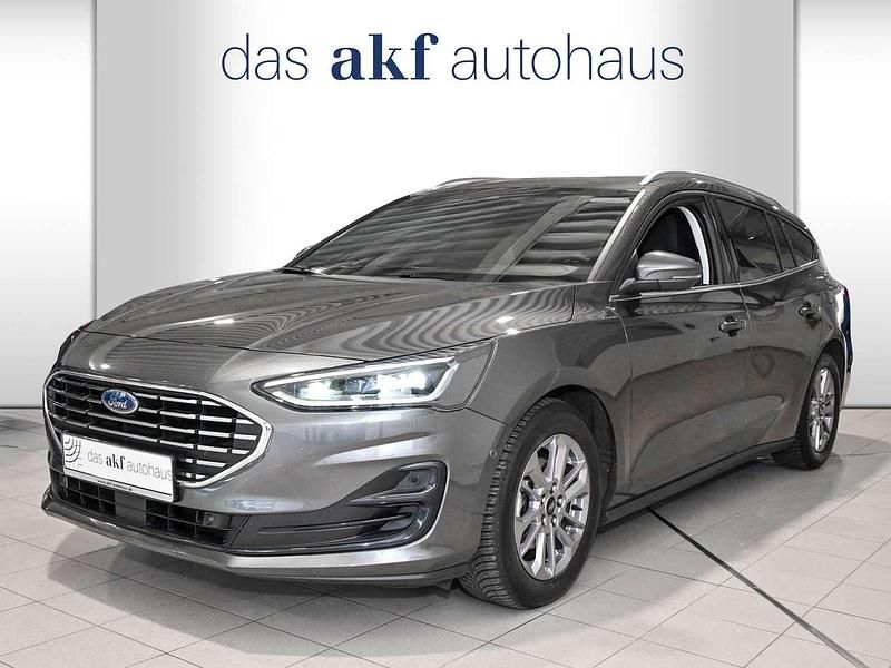 Magneticgrau (metallic) Gebraucht 2024 Ford Focus Titanium Kombi | 23.850 € (Fairer Preis) - Bild 1/4