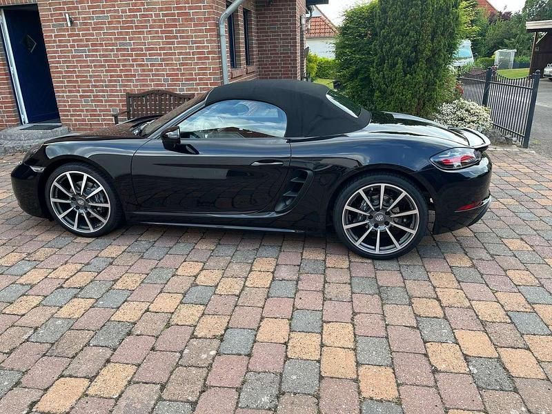 Tiefschwarzmetallic Gebraucht 2015 Porsche Boxster Cabrio | 52.990 € - Bild 1/4