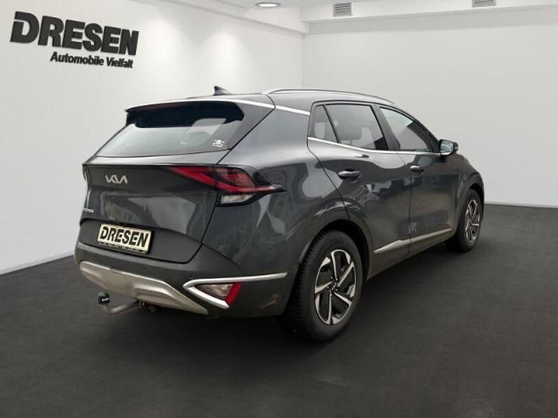 Gebraucht Kia Sportage Vision 160 PS (117 kW) 2024 H8g) pentametal met. (grau SUV