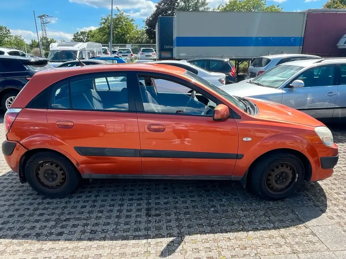 Gebraucht Kia Rio 110 PS (80 kW) 2009 Orange Kleinwagen