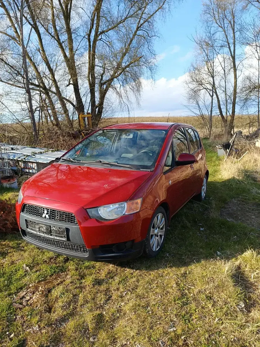 Gebraucht Mitsubishi Colt 95 PS (69 kW) 2011 Rot Kleinwagen