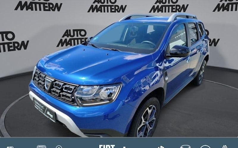 Stahlblau metallic (metallic) Gebraucht 2021 Dacia Duster Celebration SUV | 17.490 € (Fairer Preis) - Bild 1/4