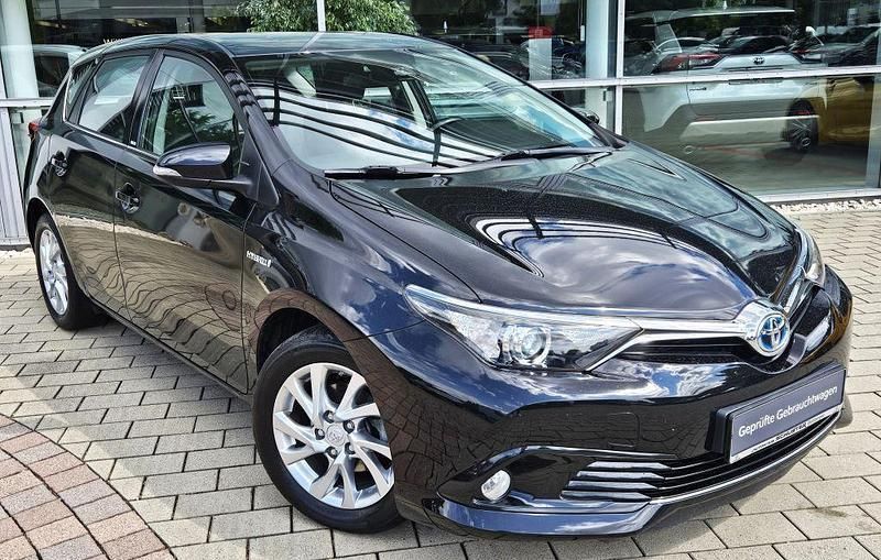 Schwarz Gebraucht 2016 Toyota Auris Hybrid Edition-S Limousine | 12.950 € (Fairer Preis) - Bild 1/4