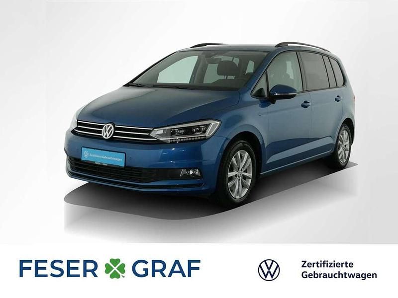 Caribbean blue metallic Gebraucht 2018 VW Touran Comfortline Van / Kleinbus | 21.611 € (Fairer Preis) - Bild 1/2