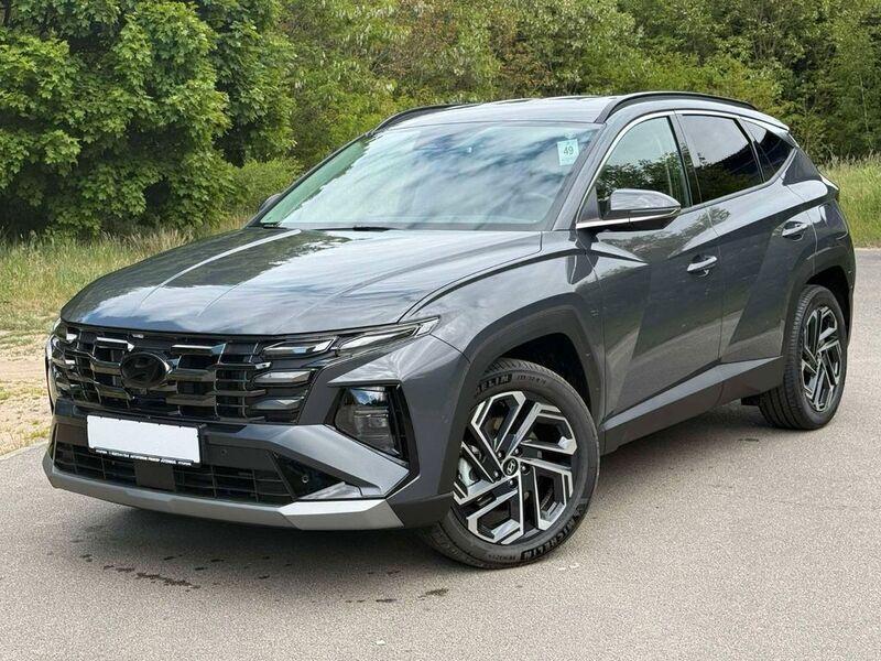 Grau Neu 2024 Hyundai Tucson Prime SUV | 45.890 € (Teuer) - Bild 1/4