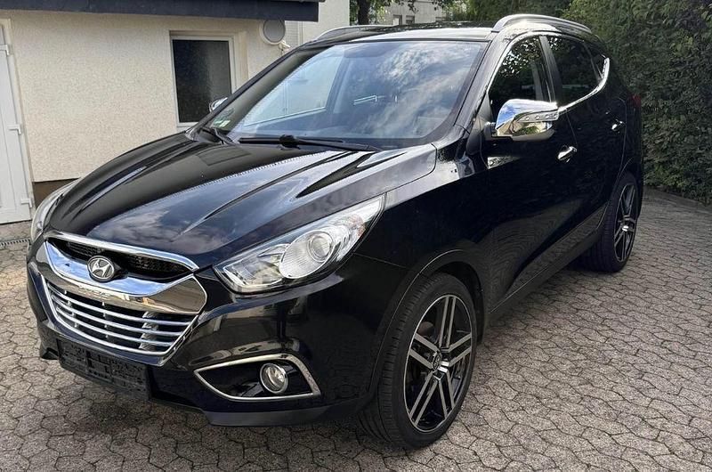 Schwarz Gebraucht 2011 Hyundai Tucson SUV | 11.000 € - Bild 1/4