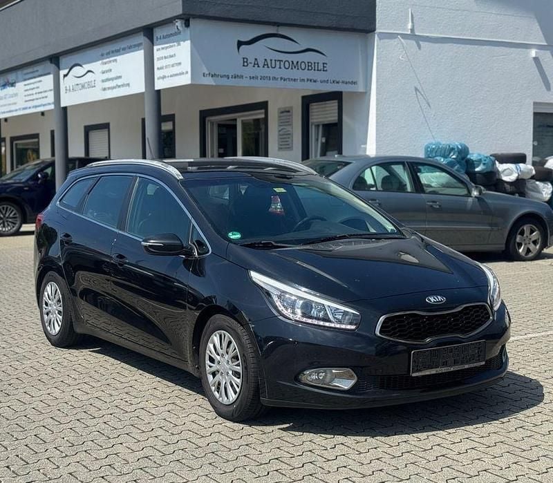 (1k) black pearl Gebraucht 2013 Kia Ceed Sportswagon Kombi | 4.500 € (Fairer Preis) - Bild 1/4