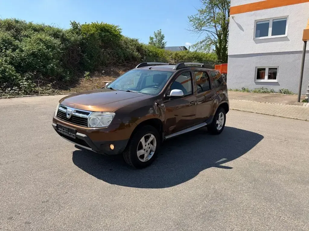 Gebraucht Dacia Duster Basis 105 PS (77 kW) 2011 Braun SUV