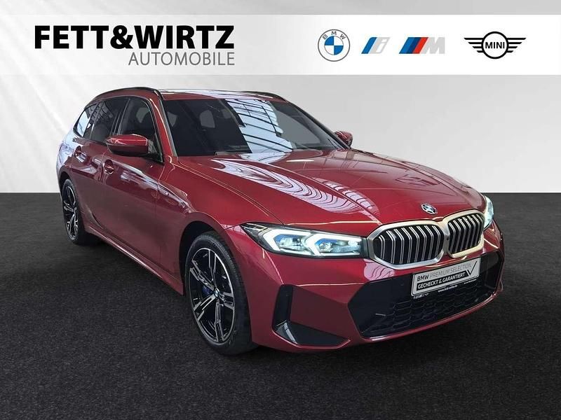 Gebraucht BMW 330e Performance 292 PS (214 kW) 2024 Fire red metallic Kombi