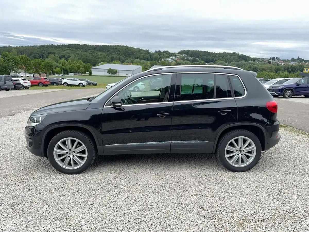 Gebraucht VW Tiguan Sport 211 PS (155 kW) 2013 Black (metallic) SUV