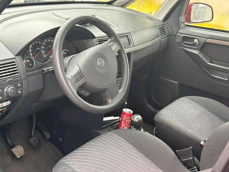 Second-hand Opel Meriva 100 CP (73 kW) 2007 Roșu Monovolum