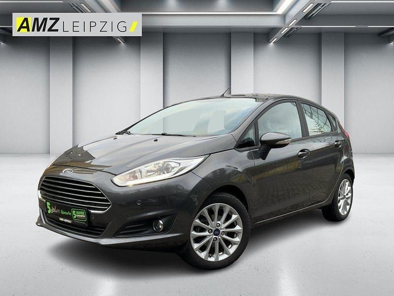 Magneticgrau (metallic) Gebraucht 2015 Ford Fiesta Trend Kleinwagen | 8.490 € (Etwas zu teuer) - Bild 1/4