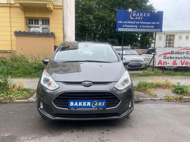 Grau Gebraucht 2016 Ford B-MAX Titanium Van / Kleinbus | 10.990 € (Fairer Preis) - Bild 1/4