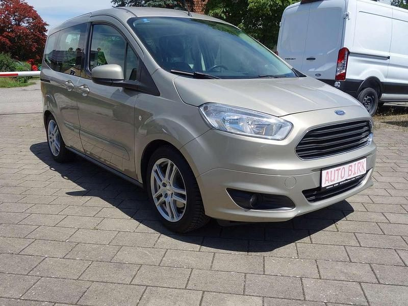 Titangrau metallic Gebraucht 2014 Ford Tourneo Courier Trend Van / Kleinbus | 6.890 € (Teuer) - Bild 1/4