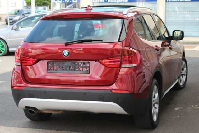 Gebraucht BMW X1 150 PS (110 kW) 2010 Rot metallic SUV