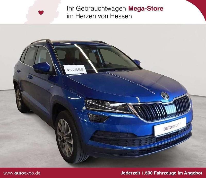 Race blau metallic Gebraucht 2021 Skoda Karoq Clever SUV | 17.389 € - Bild 1/4