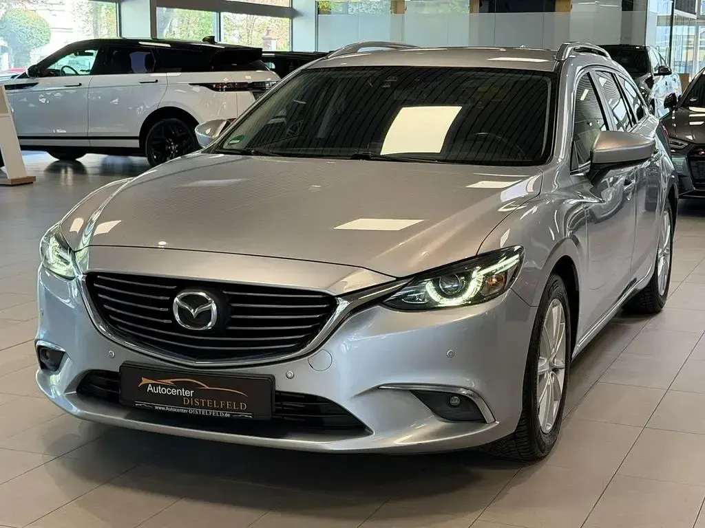 Używany Mazda 6 Exclusive-Line 150 KM (110 kW) 2015 Srebrny Sedan/Limuzyna