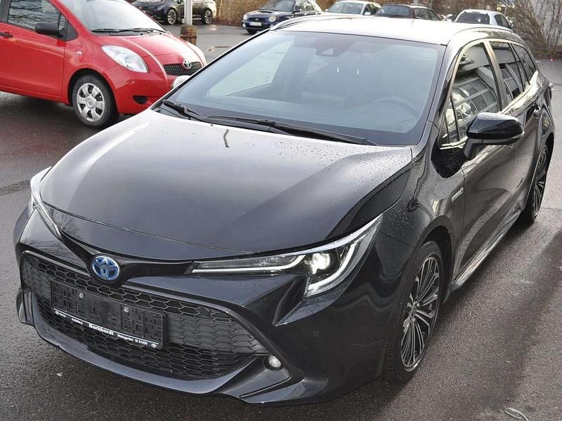 Mystikschwarz Gebraucht 2020 Toyota Corolla Hybrid Team Kombi | 17.780 € (Fairer Preis) - Bild 1/4