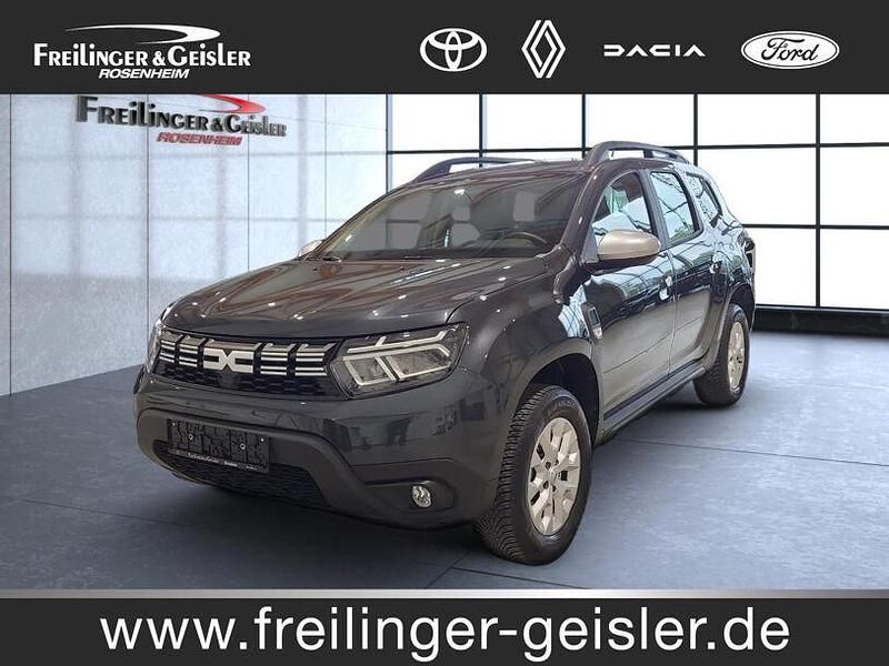 Grau comete (metallic) Gebraucht 2024 Dacia Duster Expression SUV | 19.900 € - Bild 1/4