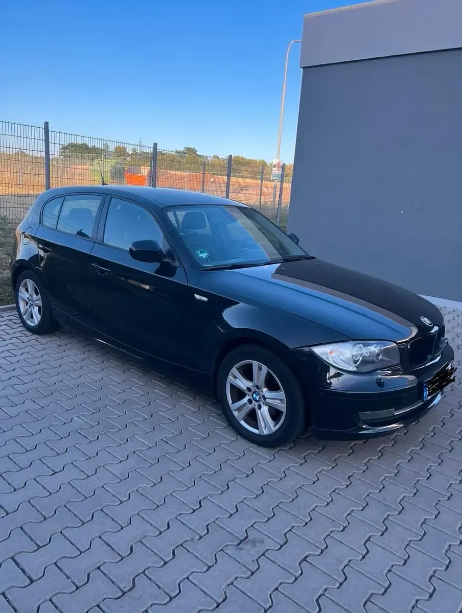 Gebraucht BMW 116 116 PS (85 kW) 2010 Schwarz Kleinwagen