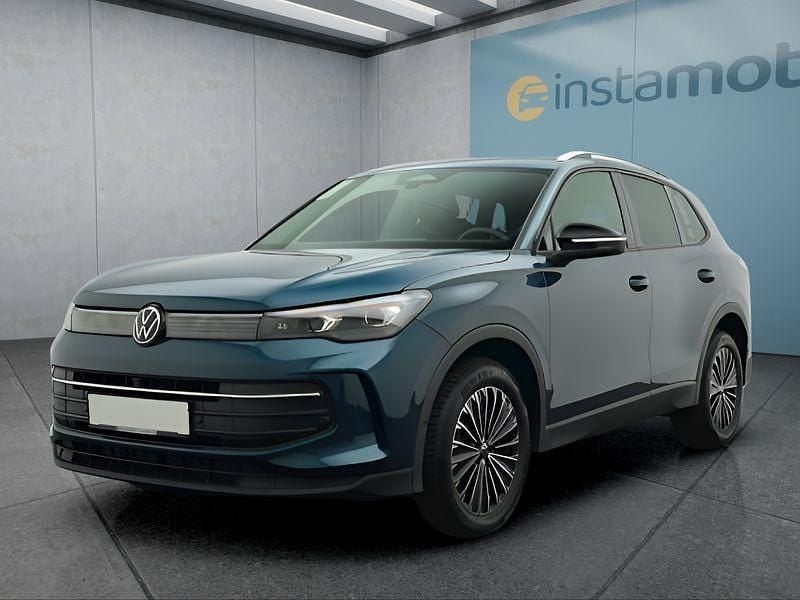 Blau Gebraucht 2024 VW Tiguan SUV | 43.849 € (Fairer Preis) - Bild 1/4
