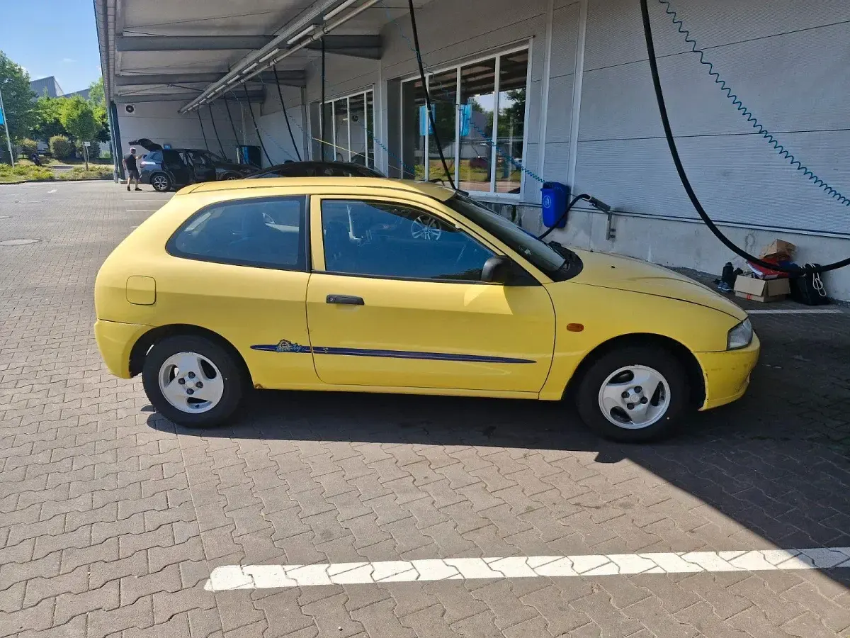 Gebraucht Mitsubishi Colt 75 PS (55 kW) 1997 Gelb Kleinwagen