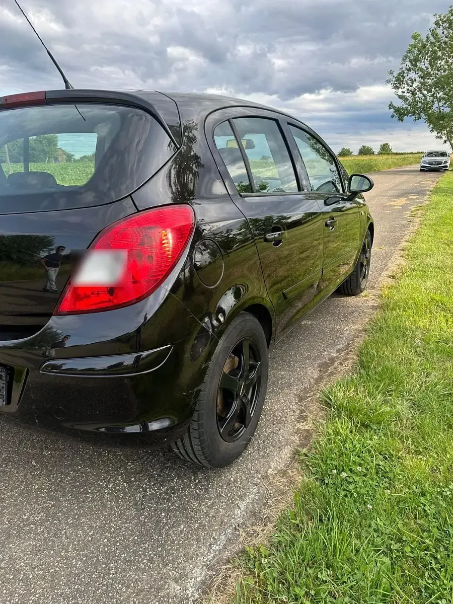 Gebraucht Opel Corsa 87 PS (63 kW) 2011 Schwarz Kleinwagen