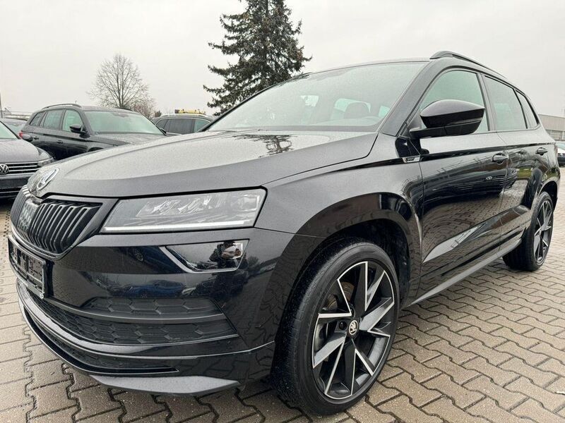 Schwarz Gebraucht 2021 Skoda Karoq SportLine SUV | 24.690 € (Superpreis) - Bild 1/4