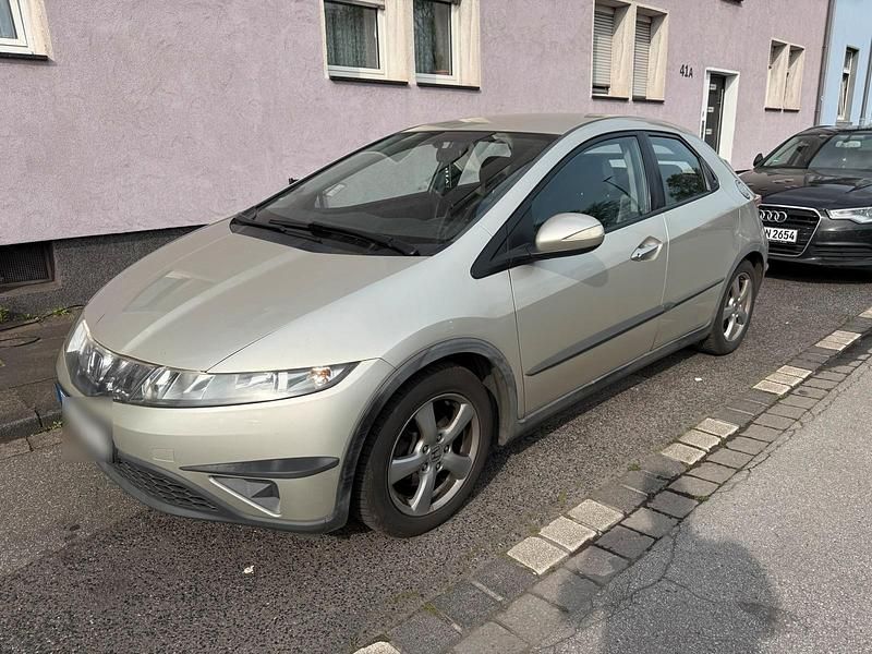 Second-hand Honda Civic 83 CP (61 kW) 2007 Auriu Hatchback