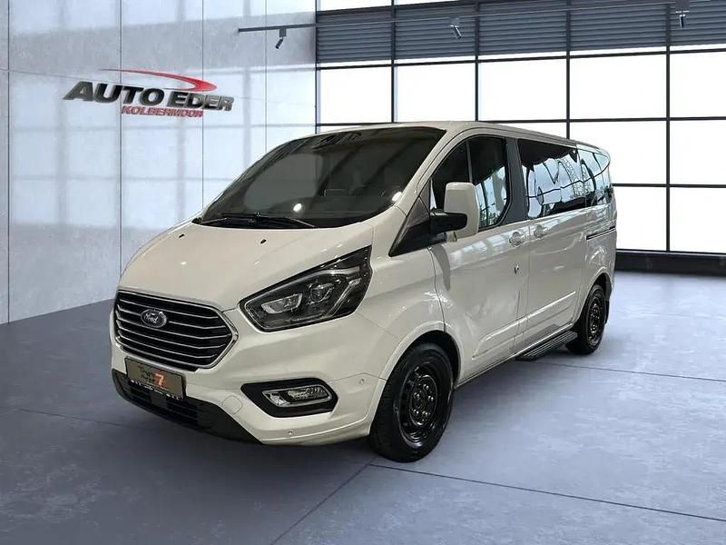 Frostweiß (weiß) Gebraucht 2023 Ford Tourneo Custom Titanium Van / Kleinbus | 43.880 € - Bild 1/4