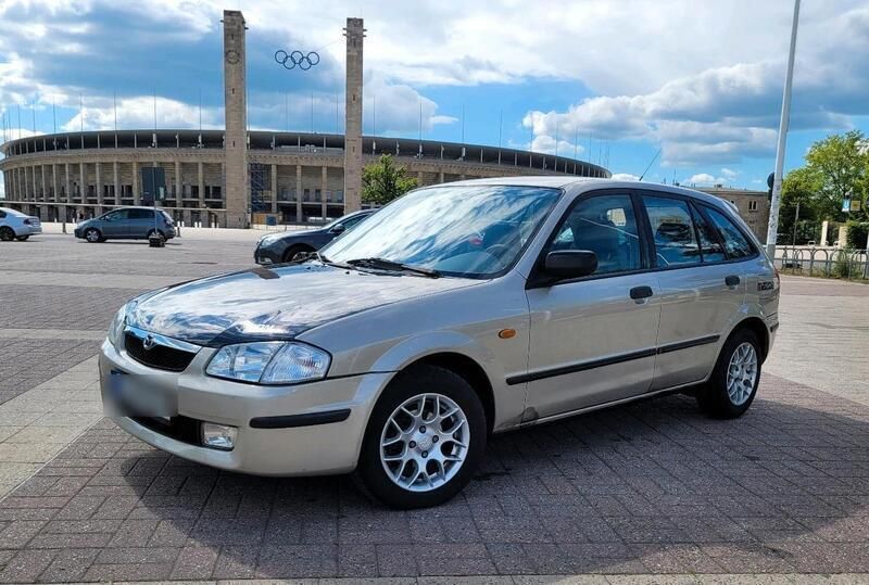 Gold Gebraucht 1998 Mazda 323 Kombi | 999 € - Bild 1/4