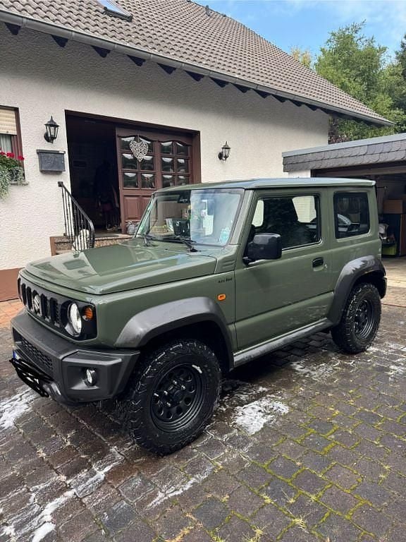 Grün Gebraucht 2023 Suzuki Jimny Comfort SUV | 29.000 € (Guter Preis) - Bild 1/4