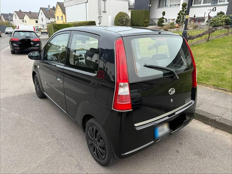 Gebraucht Daihatsu Cuore 58 PS (42 kW) 2006 Schwarz Kleinwagen
