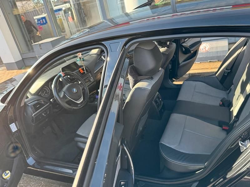 Gebraucht BMW 118 Advantage 143 PS (105 kW) 2014 Schwarz Kleinwagen