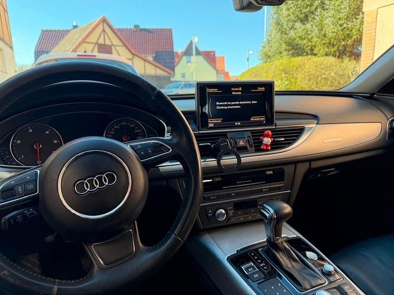 Używany Audi A6 Ambiente 245 KM (180 kW) 2012 Czarny Kombi