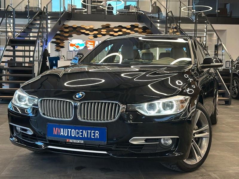 Schwarz Gebraucht 2012 BMW 335 Comfort Edition Limousine | 13.499 € (Superpreis) - Bild 1/4