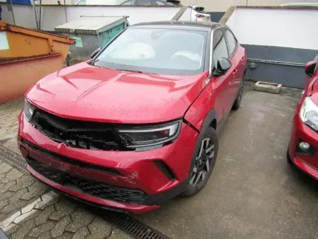 Gebraucht Opel Mokka-e Elegance 100 kW (136 PS) 2023 Lack grau artense/typ aussenverkleidung metalliclackierung SUV