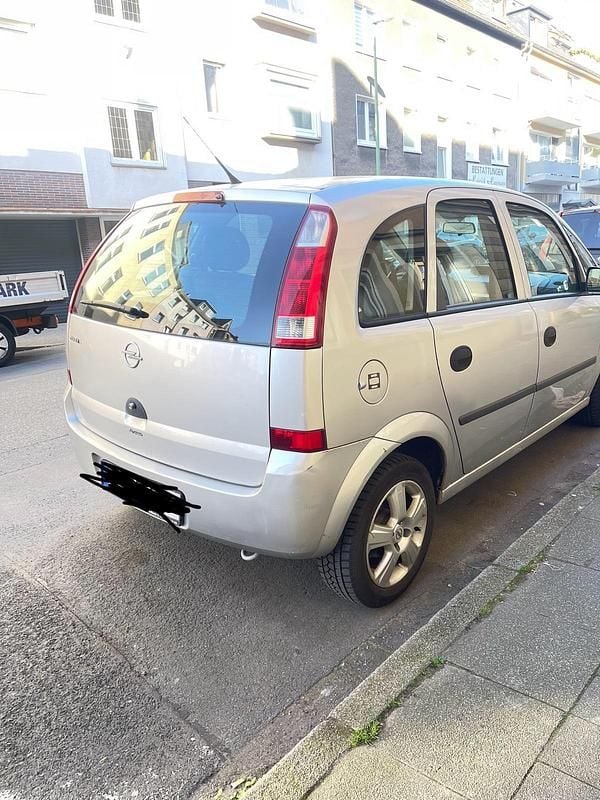 Second-hand Opel Meriva 100 CP (73 kW) 2003 Argintiu Monovolum