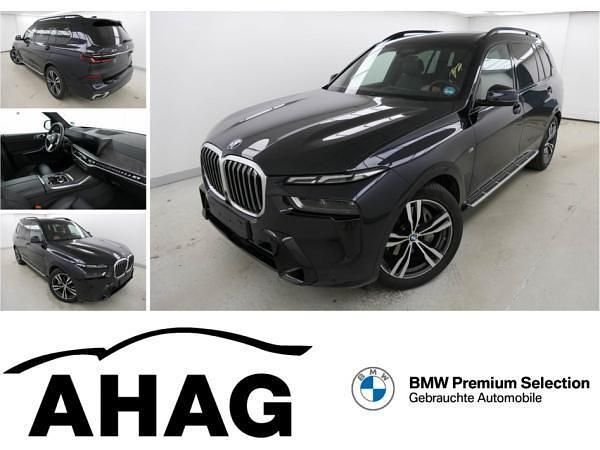 Schwarz (m carbonschwarz metallic) Gebraucht 2024 BMW X7 M Sport SUV | 84.840 € (Guter Preis) - Bild 1/4