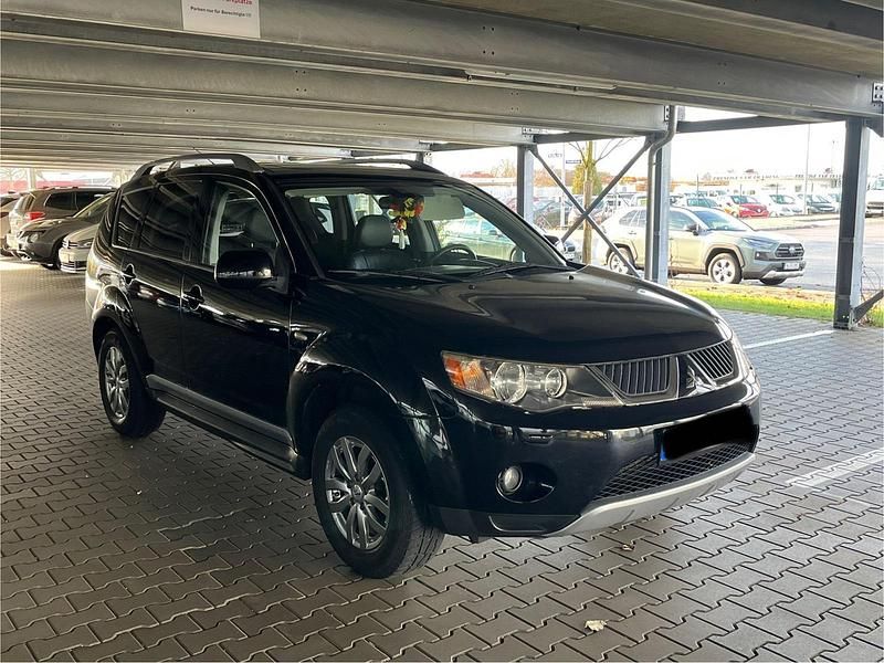 Schwarz Gebraucht 2009 Mitsubishi Outlander SUV | 3.700 € (Superpreis) - Bild 1/4