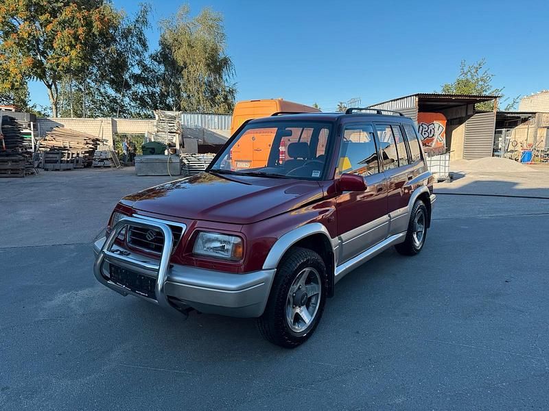 Rot Gebraucht 1996 Suzuki Vitara SUV | 5.900 € - Bild 1/4