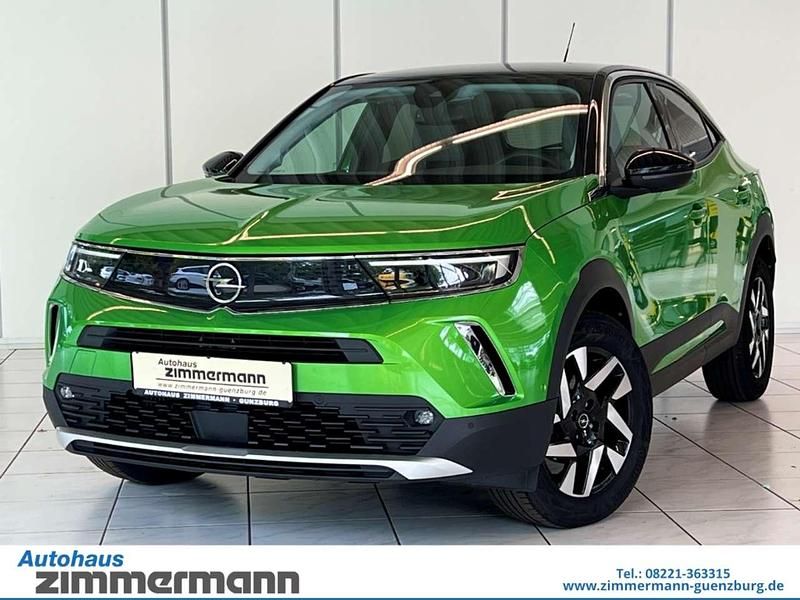 Gebraucht Opel Mokka Elegance 101 PS (74 kW) 2021 Matcha green/ikone gruen SUV