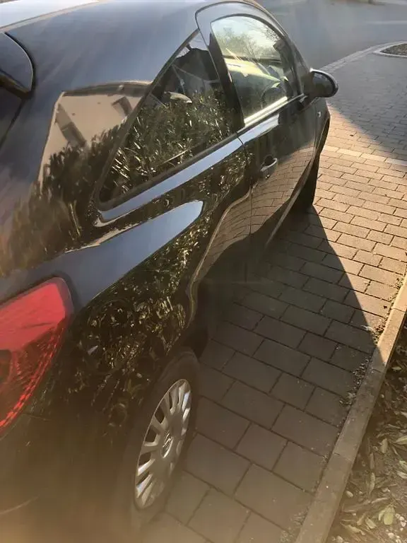 Gebraucht Opel Corsa Edition 69 PS (50 kW) 2014 Schwarz Kleinwagen
