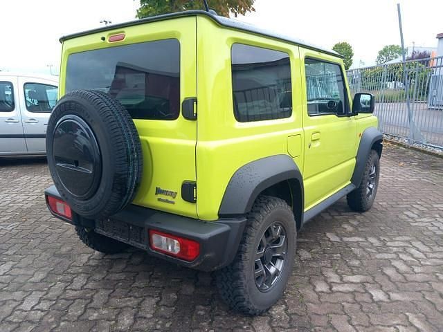Kinetic yellow kinetic yellow Gebraucht 2020 Suzuki Jimny Comfort+ SUV | 29.564 € (Etwas zu teuer) - Bild 1/4