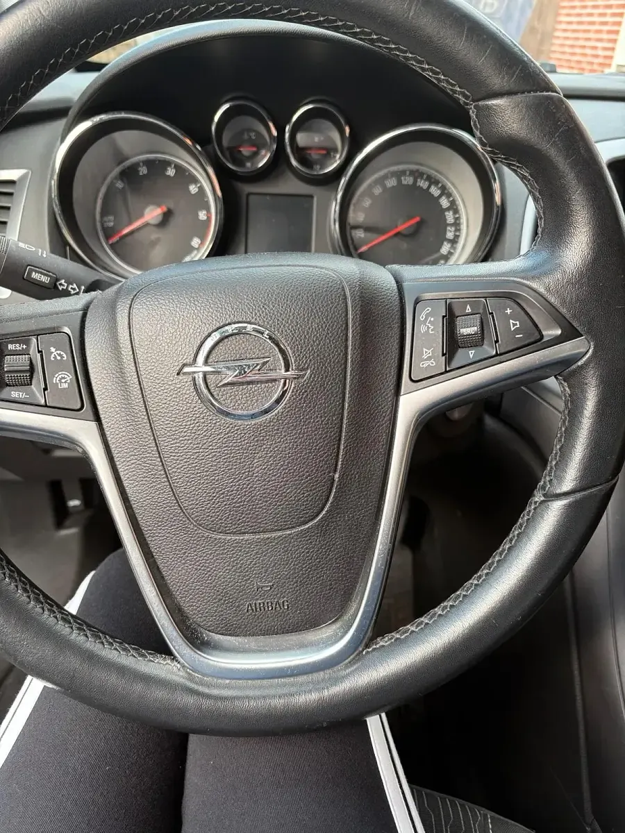 Używany Opel Astra 110 KM (80 kW) 2015 Czarny Kombi